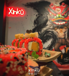 🍣 Descobreix l'Autèntic Menjar Oriental a Xīnk Restaurant Asiàtic a Andorra la Vella 🍣 Si cerques autèntic menjar oriental en un ambient únic, Xīnkǔ és el lloc perfecte. Sabors intensos, plats sorprenents i una proposta que et transportarà amb cada mos a l'autèntic sabor de la cuina asiàtica. 🌟🍴 Ubicació:   Estem situats al Cap del Carrer, 1, AD500 Andorra la Vella, Andorra, una mica més amunt de Can Manel i a 1 minut del Comú d’Andorra la Vella. Reserva la teva taula per WhatsApp al +376658850.  Horaris:   Dimarts a diumenge: - Migdia: 13-15:30 h  - Nit: 20-22:30 h Cuina i Servei:   A Xīnku, la taula està servida i plena de sabor. T'esperem amb sabors orientals procedents de l'autèntica Àsia. Podem afirmar que el nostre restaurant és l'únic autènticament asiàtic d'Andorra, oferint sabors reinventats, ingredients frescos i una experiència gastronòmica exclusiva. 🥢🍜 Plats d'Autor i Fusió:   Xīnku Andorra és conegut per la seva combinació única de cuina de fusió asiàtica. Alguns dels plats d'autor que voldreu provar inclouen: - Rotllos de Sushi, elaborats amb un toc creatiu. - Saborosos Bols de Ramen. - Pa Bao  - Plats d'Estil Tapes, que incorporen sabors asiàtics amb ingredients locals. Ingredients Locals i Tradició:   Xīnkǔ Andorra incorpora creativament ingredients locals a la seva carta, combinant elements tradicionals andorrans amb sabors asiàtics. Utilitzem productes, carns i formatges d'origen local per crear plats únics que destaquen el patrimoni culinari de la regió, oferint un toc modern. Ambient:   Xīnkǔ Andorra ofereix un ambient gastronòmic modern i vibrant. L'interior està decorat amb estil, creant un entorn animat però còmode per als hostes. L'ambient és perfecte per gaudir d'un àpat amb amics o d'un sopar especial amb un ésser estimat. Maridatge:   Tot i que no tenim recomanacions específiques de maridatge de vins, puc suggerir alguns maridatges generals que poden millorar la vostra experiència gastronòmica: - Riesling o Gewürztraminer floral per la cuina asiàtica. - Pinot Noir o Priorat per acompanyar els sabors més intensos. Experiències Gastronòmiques:   Xīnku Andorra ofereix diverses experiències gastronòmiques úniques durant tot l'any, centrades en la fusió de la cuina asiàtica i mediterrània. Sovint organitzen nits temàtiques i menús degustació de temporada que destaquen els ingredients locals i frescos. També organitzen tallers de cuina i esdeveniments de maridatge de vins que ofereixen una immersió més profunda en la nostra filosofia culinària. Estàs pensant a sopar-hi durant la teva visita? Truca al nostre WhatsApp i reserva la teva taula! 📲✨ #XinkuAndorra #AndorraLaVella #CuinaAsiàtica #Sushi #Ramen #TapesAsiàtiques #ProductesLocals #Gastronomia #MaridatgeDeVins #AltaCuina #AmbientsVibrants #FusióCulinària #MenjarAutèntic #ExperiènciaGastronòmica😊📲